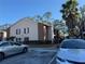 Building exterior with parking and landscaping at 21038 Voyager Blvd # 4, Land O Lakes, FL 34638