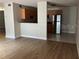 Open kitchen features stainless steel appliances and wood cabinets at 21038 Voyager Blvd # 4, Land O Lakes, FL 34638