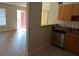 View of kitchen and living area with an open floor plan at 21038 Voyager Blvd # 4, Land O Lakes, FL 34638