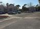 View of parking lot with cars and landscaping at 21038 Voyager Blvd # 4, Land O Lakes, FL 34638