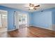 Bedroom with sliding glass doors leading to a patio at 224 Sky Loch E Dr, Dunedin, FL 34698