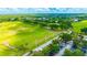 Aerial view of a driving range with parking at 2852 Banyan Hill Ln, Land O Lakes, FL 34639