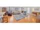 Spacious living room with hardwood floors and ample natural light at 2852 Banyan Hill Ln, Land O Lakes, FL 34639