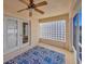 Relaxing screened porch with glass block wall at 2852 Banyan Hill Ln, Land O Lakes, FL 34639
