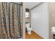 Bathroom with banana shower curtain and toilet at 3436 51St N Ave, St Petersburg, FL 33714