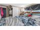 Main bedroom with unmade bed and Mickey Mouse toy at 3436 51St N Ave, St Petersburg, FL 33714