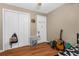 Bedroom with double doors and a guitar in the corner at 3436 51St N Ave, St Petersburg, FL 33714