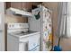 White stove and refrigerator in a small kitchen at 3436 51St N Ave, St Petersburg, FL 33714