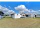 View of backyard and neighboring homes at 35216 Dodie Dr, Zephyrhills, FL 33541