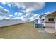 Mobile home community with grassy backyard at 35216 Dodie Dr, Zephyrhills, FL 33541
