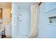 Simple bathroom with a shower stall and beige tile at 35216 Dodie Dr, Zephyrhills, FL 33541