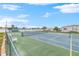 Well-maintained tennis court with green surface at 35216 Dodie Dr, Zephyrhills, FL 33541