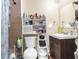 Bathroom with toilet, sink, and storage at 4734 15Th S Ave, St Petersburg, FL 33711