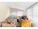 Small bedroom with a bed and dresser at 4734 15Th S Ave, St Petersburg, FL 33711