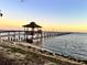 Long pier extending into the water with gazebo at 7 Desoto E St, Bradenton, FL 34208