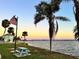 Scenic waterfront property with a tranquil sunset view at 7 Desoto E St, Bradenton, FL 34208