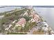 Aerial view of waterfront condos and lush landscaping at 7540 Sunshine Skyway S Ln # 220, St Petersburg, FL 33711
