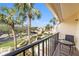 Balcony with seating and community view at 7540 Sunshine Skyway S Ln # 220, St Petersburg, FL 33711