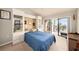 Guest bedroom with built-in shelving at 7540 Sunshine Skyway S Ln # 220, St Petersburg, FL 33711