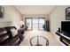 Living room with water views and comfy seating at 7540 Sunshine Skyway S Ln # 220, St Petersburg, FL 33711