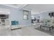 Bright and airy living room showcasing open floor plan and modern finishes at 8134 Bayshore Dr, Seminole, FL 33776