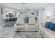 Inviting living area with seamless open floor plan, connecting to the kitchen area at 8134 Bayshore Dr, Seminole, FL 33776