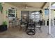 Covered patio features dining area and bar-style seating at 8134 Bayshore Dr, Seminole, FL 33776