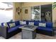 Inviting screened porch with comfortable seating and a view into the home, perfect for relaxing outdoors at 8134 Bayshore Dr, Seminole, FL 33776