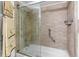 Updated bathroom with a tub and shower combo at 10449 Larchmont N Pl, Pinellas Park, FL 33782