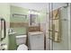 Bathroom features a walk-in shower and tile flooring at 10449 Larchmont N Pl, Pinellas Park, FL 33782