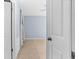 Spacious bedroom with tile floors and access to a private patio at 10449 Larchmont N Pl, Pinellas Park, FL 33782