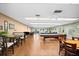 Large recreation area with pool table and seating, perfect for socializing and relaxation at 10449 Larchmont N Pl, Pinellas Park, FL 33782