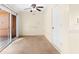 Small laundry/storage room with tile floor and exterior access at 10449 Larchmont N Pl, Pinellas Park, FL 33782