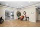 Welcoming lobby area with comfortable seating and access to a dining hall at 10449 Larchmont N Pl, Pinellas Park, FL 33782