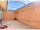 Covered patio with terracotta tile and skylight, great for relaxing at 10449 Larchmont N Pl, Pinellas Park, FL 33782
