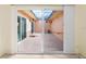 Spacious covered patio with tile flooring, ideal for outdoor relaxation at 10449 Larchmont N Pl, Pinellas Park, FL 33782