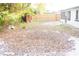 Large backyard with a wooden fence and plenty of space at 11300 Yellowwood Ln, Port Richey, FL 34668