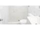 Clean bathroom with white tile and updated fixtures at 11300 Yellowwood Ln, Port Richey, FL 34668
