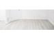 Empty bedroom with new flooring and neutral walls at 11300 Yellowwood Ln, Port Richey, FL 34668