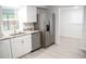 Updated kitchen with stainless steel appliances and granite countertops at 11300 Yellowwood Ln, Port Richey, FL 34668