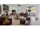 A spacious living room features a fireplace, sliding glass doors to the patio, and hardwood floors at 22847 Sonoma Ln, Lutz, FL 33549