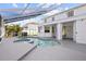 Inviting screened-in pool area with a uniquely shaped pool and a covered patio offering outdoor enjoyment at 22847 Sonoma Ln, Lutz, FL 33549