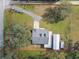 Aerial view of a house with a large yard and detached shed at 4003 Bruton Rd, Plant City, FL 33565