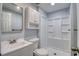 Clean bathroom with shower stall, toilet, and vanity at 4110 Wedgemere Dr, Tampa, FL 33610