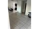 Bright living room with tile floors and an open floor plan at 4616 River Hills Dr, Tampa, FL 33617