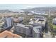 Aerial view of a modern building complex near the waterfront, showcasing the surrounding cityscape at 470 3Rd S St # 405, St Petersburg, FL 33701