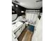 Stylish bathroom with dark vanity, white tile and modern fixtures at 470 3Rd S St # 405, St Petersburg, FL 33701