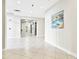Bright hallway with tile floors and elevator access at 470 3Rd S St # 405, St Petersburg, FL 33701