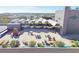 Community rooftop patio with seating, fire pit, and grills at 470 3Rd S St # 405, St Petersburg, FL 33701