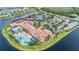 Community features pools, tennis courts, and expansive parking at 4817 Sandy Glen Way, Wimauma, FL 33598